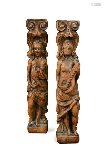 A pair of carved oak caryatids, probably 17th century,