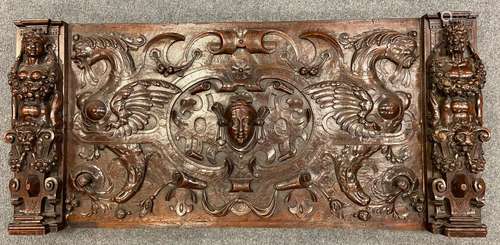 A 16th century style carved walnut panel, probably 19th century,