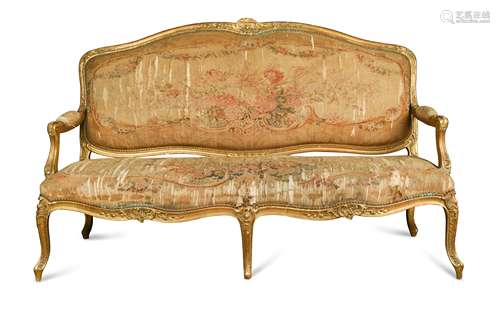 A Louis XVI style giltwood settee,