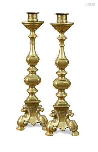 A pair of bronze candlesticks, 18th century,