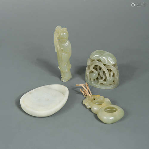 A group of four Chinese jade items: Qing Dynasty and later,