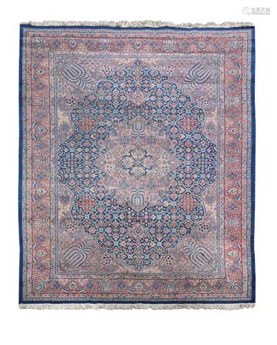 A Persian design blue ground carpet,