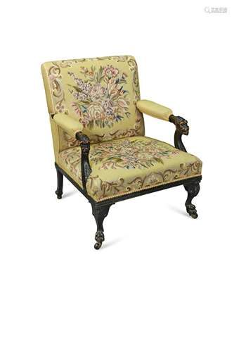 An 18th century style ebonised open arm library armchair, circa 1900,