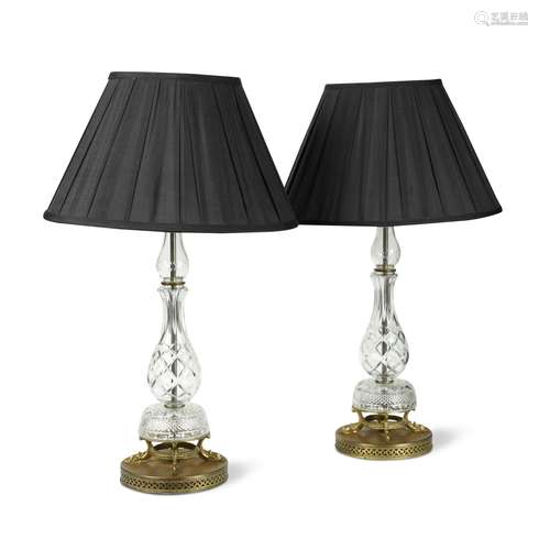 A pair of cut glass table lamps,