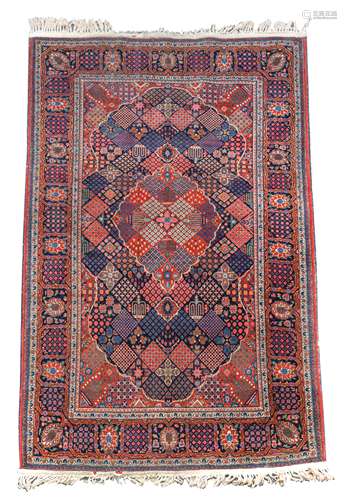 A finely-woven Kashan rug to a Josheghan design,