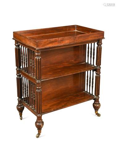 A Regency mahogany double sided open bookcase in the manner of Gillows,