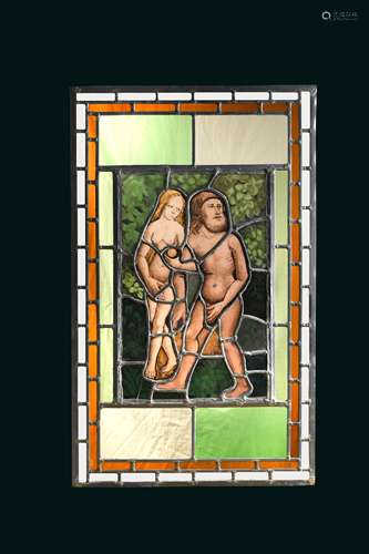 A 17th century stained glass panel of Adam and Eve,