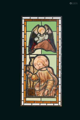 A 17th or 18th century stained glass panel of an angel,