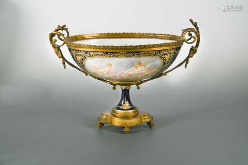 A Sevres two-handled metal mounted pedestal bowl,