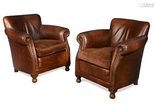 A pair of leather club arm chairs, modern,