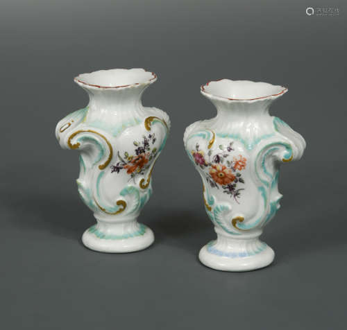 A pair of 18th century Derby patch mark miniature rococo vases,