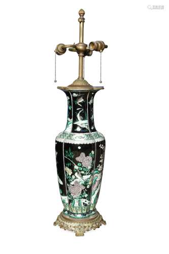 A 19th century famille noir vase, now mounted as a lamp,