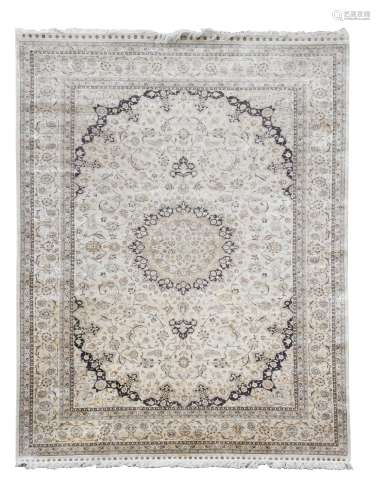 A large Hereke silk carpet,
