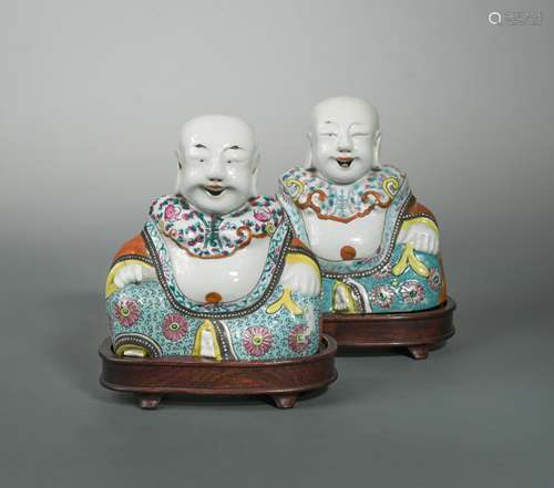 A pair of Chinese export famille rose porcelain seated figures of Buddhai, early Republic period,