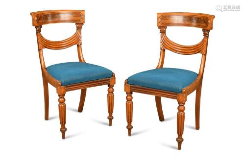A pair of late Regency mahogany dining chairs,