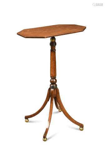 A mahogany and oak height adjustable pedestal occasional table