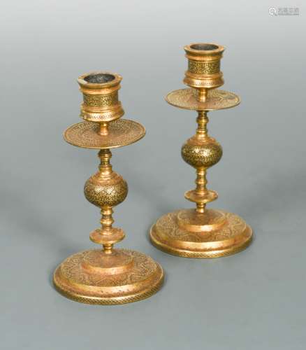 A pair of Toledo Ware candlesticks, probably 19th century,
