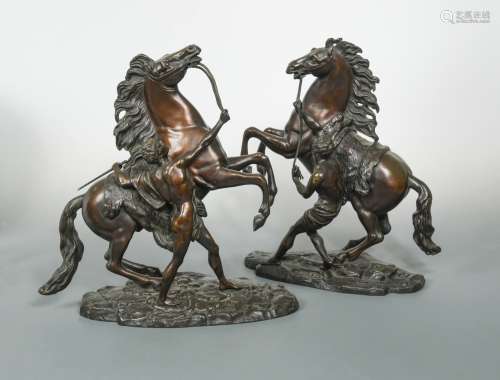 Guillaume Coustou (1677-1746), a pair of late 19th century French bronze Mali horses,