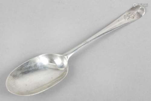 A George I Britannia silver spoon in Hanoverian pattern with long rat-tail to heel and monogram