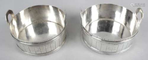 A pair of William IV Irish silver coasters,
