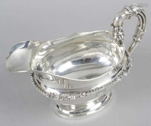 A late George III silver sauce boat,