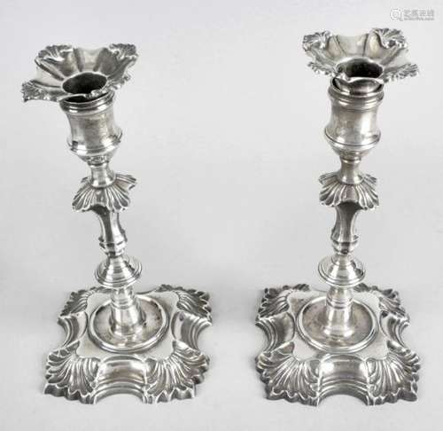 A pair of George II cast silver candlesticks by John Cafe,