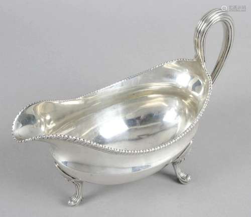 A George III silver sauce boat,