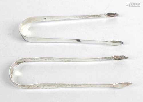 Two pairs of George III silver sugar tongs,