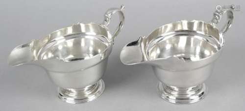 A fine pair of early George II silver sauce boats,