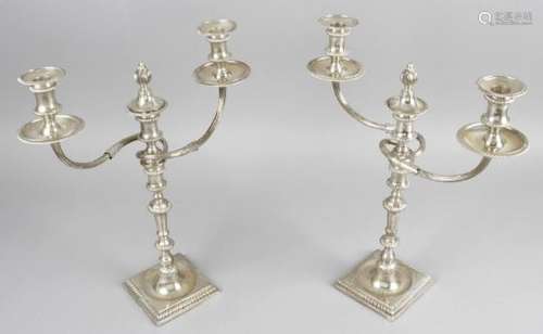 A pair of mid-20th century silver twin-branch candelabra,