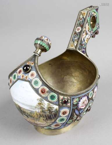 An early 20th century Russian silver and enamel kovsh,