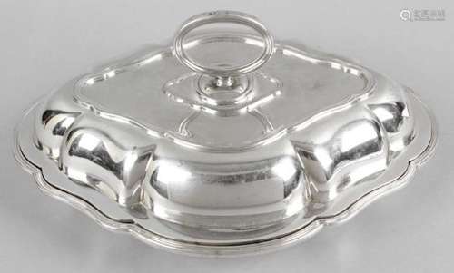 A George V silver entrée dish and cover of oval form with scalloped edge,