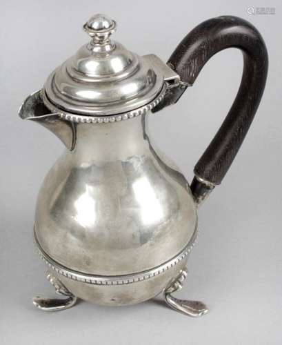 A late Victorian small silver hot water pot,