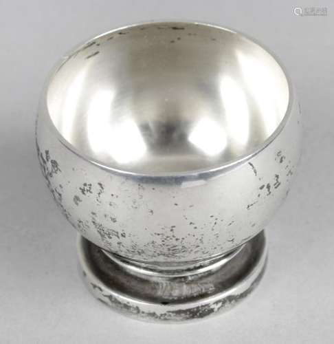 A Georg Jensen sterling silver egg cup, of plain circular form to a stepped footed base.