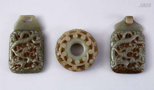 A GOOD CHINESE CARVED JADE BELT BUCKLE, the buckle carved with dragons, 14.5cm ( in two pieces ),