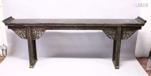 A LARGE 19TH CENTURY CHINESE CARVED HARDWOOD ALTER TABLE, the apron of the table carve in