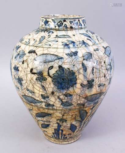 A 17TH/18TH CENTURY PERSIAN SAFAVID BULBOUS SHAPED VASE, blue painted with floral designs, 25cm