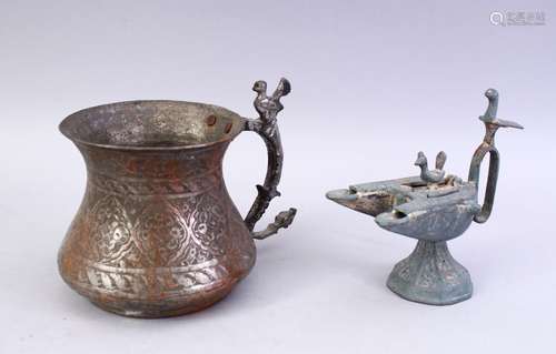 A GOOD ISLAMIC TWIN SPOUT BRONZE OIL POURER & A COPPER CALLIGRAPHIC DISH, 14cm high & 12cm.