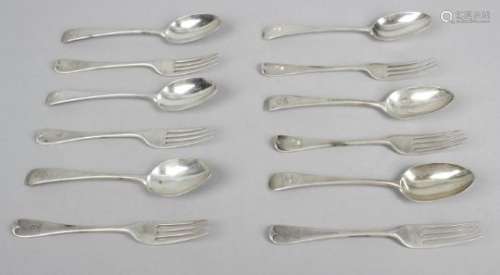 An Edwardian silver set of twelve dessert spoons and six matching dessert forks,