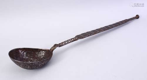 A 12TH/13TH CENTURY PERSIAN SELJUK ENGRAVED IRON LADLE, with foliate and figural decoration, 48cm