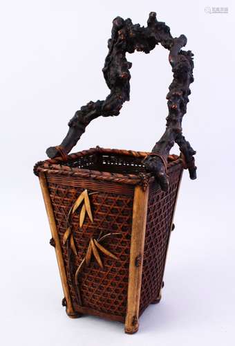 A GOOD JAPANESE WOVEN WICKER IKEBANA BASKET, decorated with bamboo 47cm.