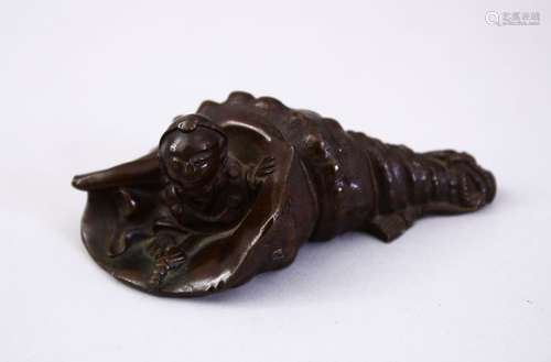 A GOOD JAPANESE BRONZE OKIMONO OF A BOY AND CONCH SHELL, base signed. 9cm.