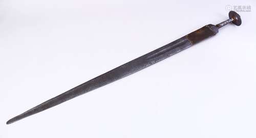 AN EARLY ISLAMIC OR EUROPEAN MEDIEVAL SWORD, with tapering double sided blade, disc shaped pommel (