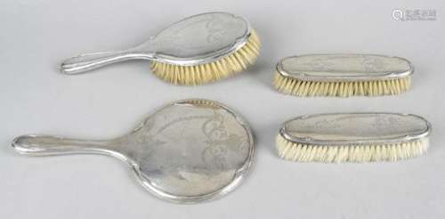 A George V silver mounted part dressing table set,