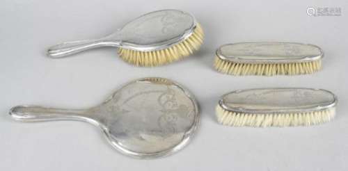 A George V silver mounted part dressing table set,