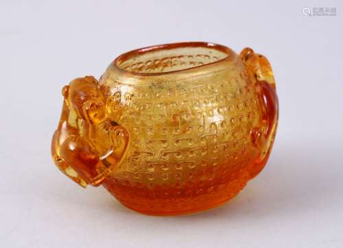 A CHINESE CARVED YELLOW ROCK CRYSTAL LIBATION CUP, with twin carved chilong handles and stud