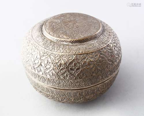 AN INDIAN WHITE METAL PANDAN BOX, engraved with floral design, 12cm.