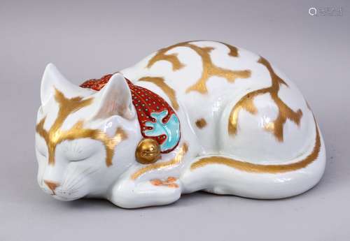 A GOOD JAPANESE MEIJI PERIOD KUTANI PORCELAIN CAT, modeled asleep, with gilt decoration, 11cm high x