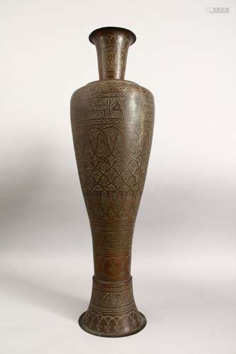 A GOOD 19TH CENTURY ISLAMIC BRONZE / BRASS CALLIGRAPHIC CHASED FLOOR STANDING VASE, with two bands