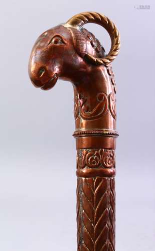 A FINE 18TH/19TH CENTURY INDIAN CEREMONIAL COPPER MACE, with ram's head finial, 58cm long.